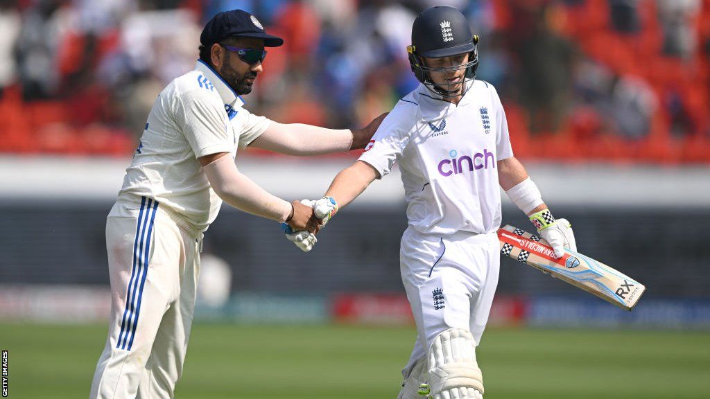 England batter Ollie Pope is given a hand shake by India captain Rohit Sharma after his dismissal