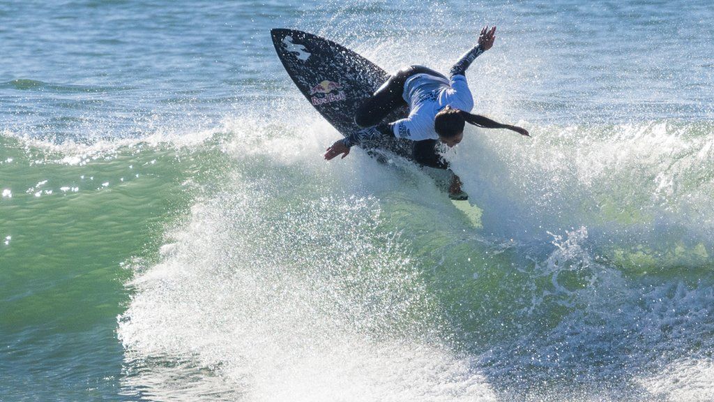 Sky Brown surfing