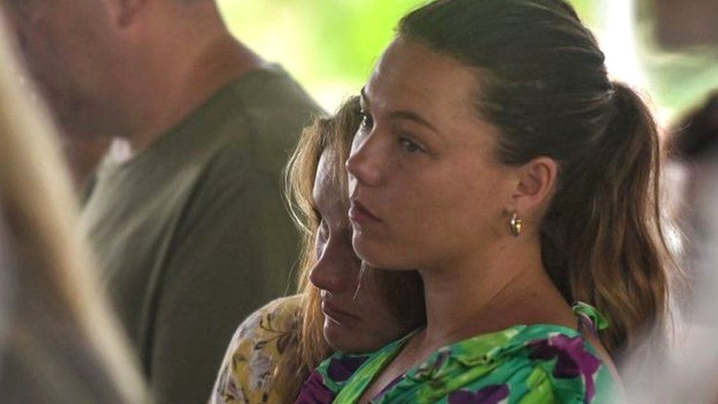 People attend a commemoration ceremony to mark the 20th anniversary of the Bali bombings