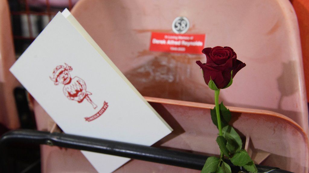 A rose tribute left by visitors Lincoln City to Derek Reynolds