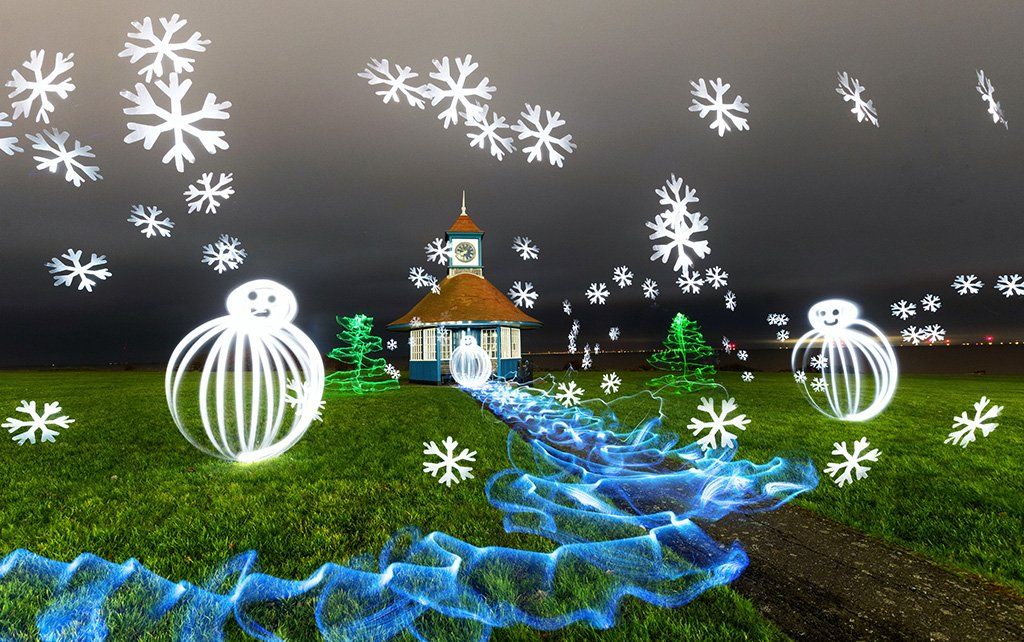 Christmas trees, snowflakes and snowmen created from light painting at Frinton clock tower
