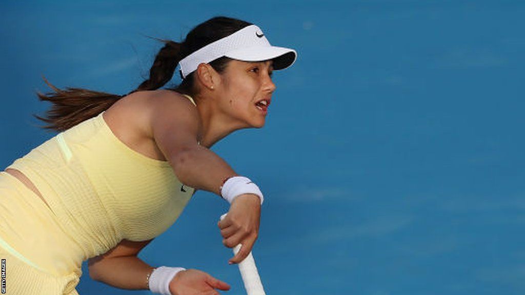 Emma Raducanu serves during her Australian Open match against Yafan Wang
