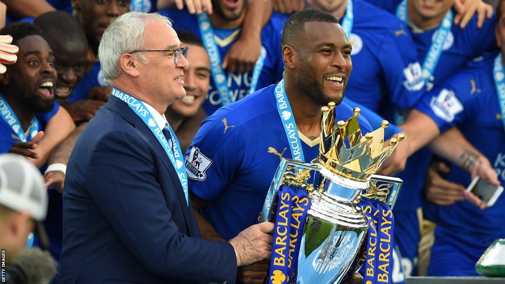 Leicester captain Wes Morgan (right) and boss Claudio Ranieri (left) with the Premier League trophy