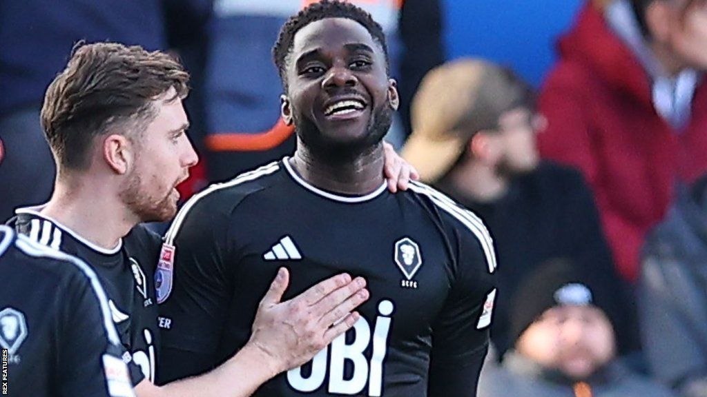 Salford City forward Junior Luamba (right)