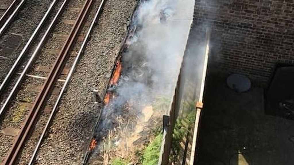 London Euston trains halted by trackside fire