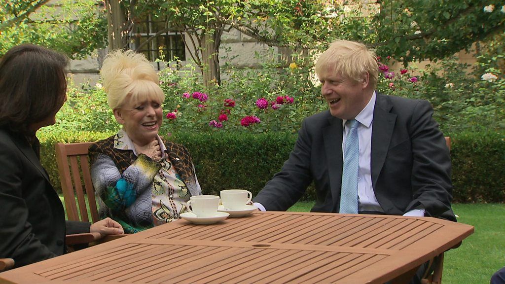 Barbara Windsor and Boris Johnson laughing