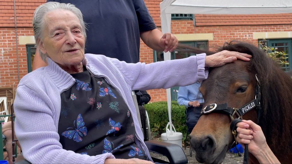 Care home resident with pony
