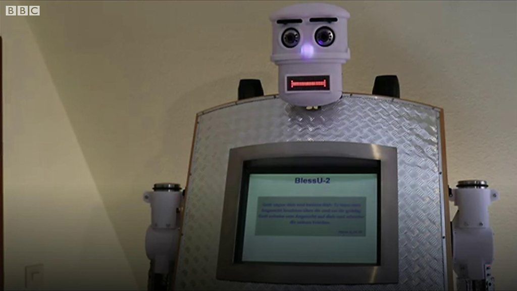 Robotic reverend blesses worshippers in eight languages