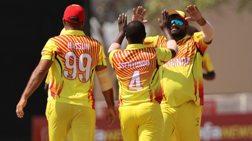 Uganda players celebrate a wicket