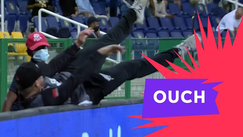 T20 World Cup - England v New Zealand: Glenn Phillips flies over advertising boards