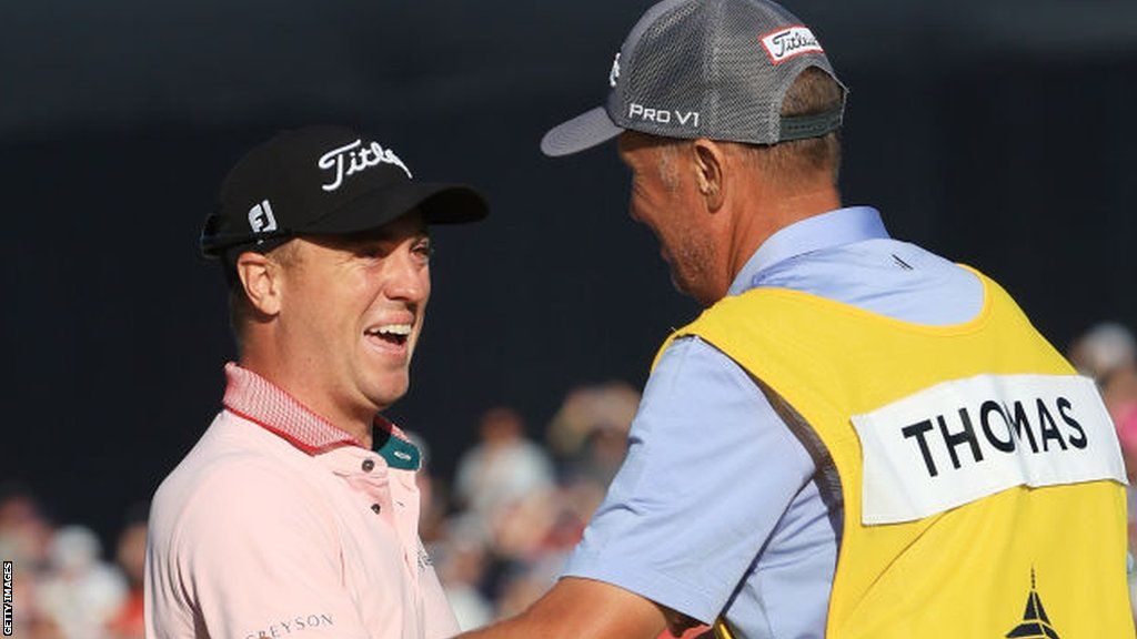 Justin Thomas celebrates with caddie Jim Mackay at the 2022 PGA Championship