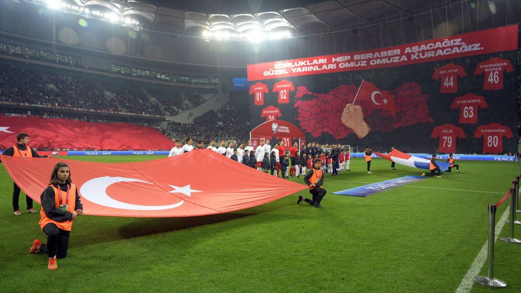 A giant banner of the Turkish map and Turkish cities affected by earthquakes displayed at Turkey's game against Croatia