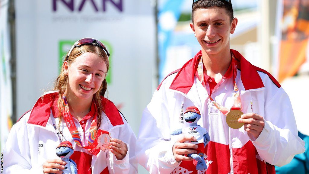 Siena Stephens and Luke Holmes get their bronze medals