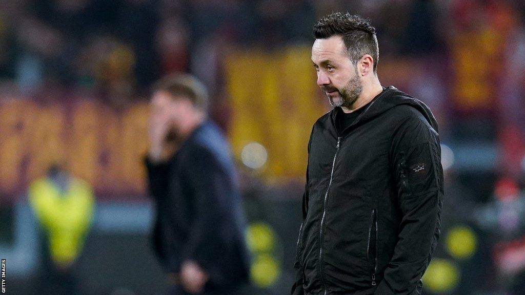 Roberto de Zerbi looks dejected during Brighton's defeat at Roma