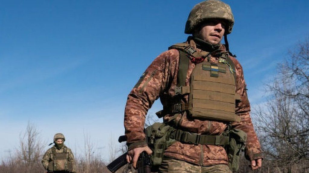 Ukrainian Servicemen patrolling along the frontline outside of Svitlodarsk during a day of heavy shelling from separatist forces