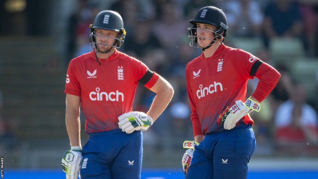England batters Jos Buttler (left) and Harry Brook (right) look on during a T20