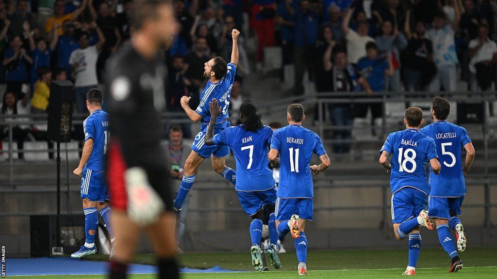 Italy celebrate after Giacomo Bonaventura scores for Italy