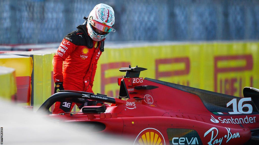 Charles Leclerc examines his Ferrari after crashing during second practice for the Miami Grand Prix