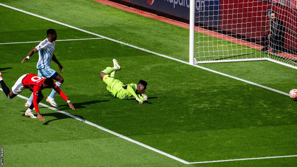 Andre Onana concedes a goal for Manchester United against Nottingham Forest