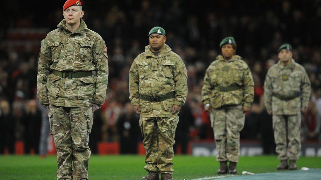 soldiers on pitch of Principality Stadium