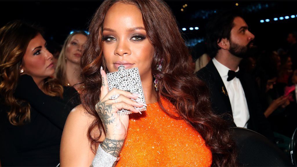 Rihanna with her hip flask