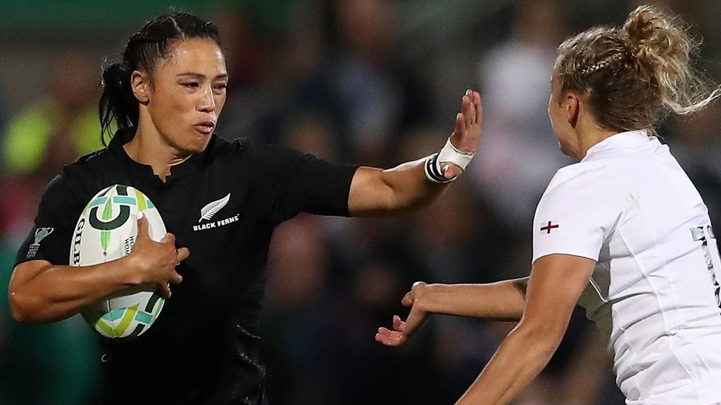 New Zealand back Carla Hohepa prepares to hand off England's Kay Wilson