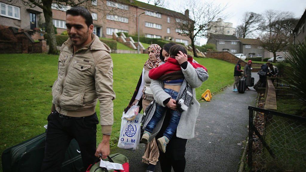 Picture of Syrian refugees arriving in the Isle of Bute, Scotland