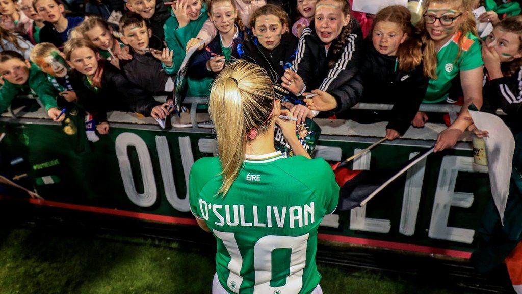 Republic of Ireland's Denise O'Sullivan signs autographs for fans after the friendly with France in Dublin