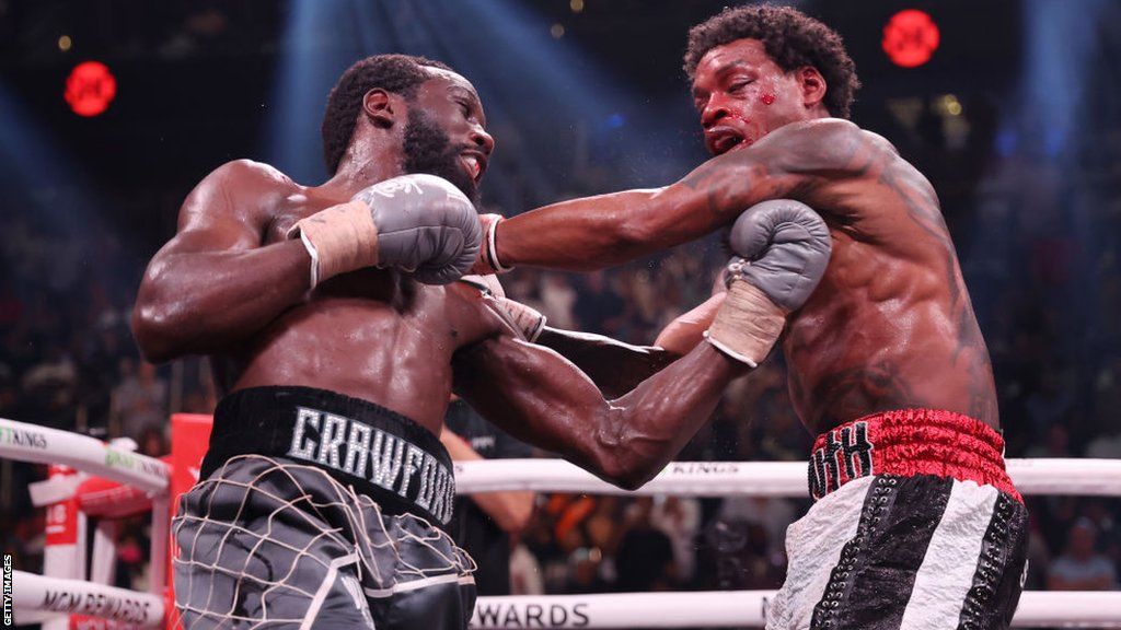 Terence Crawford lands an uppercut on Errol Spence Jr