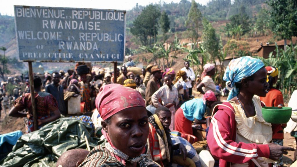 Refugees at a border crossing between Rwanda and Zaire (now the Democratic Republic of Congo) in 1994