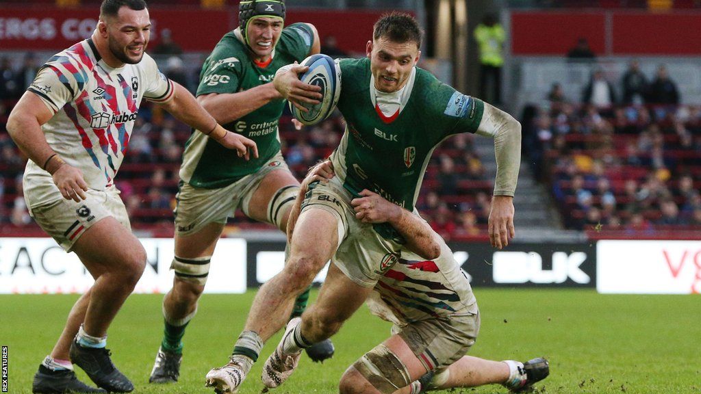Ben White of London Irish looks to evade a tackle against Bristol Bears