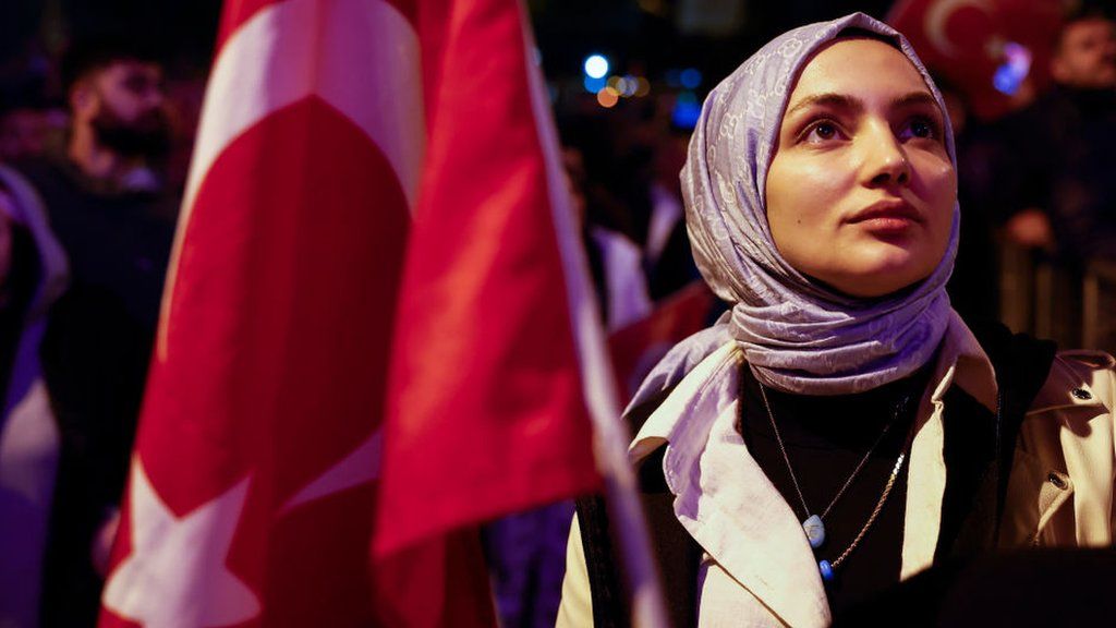 A female supporter of Turkish President Erdogan at the AK Party headquarters in Istanbul, Turkey