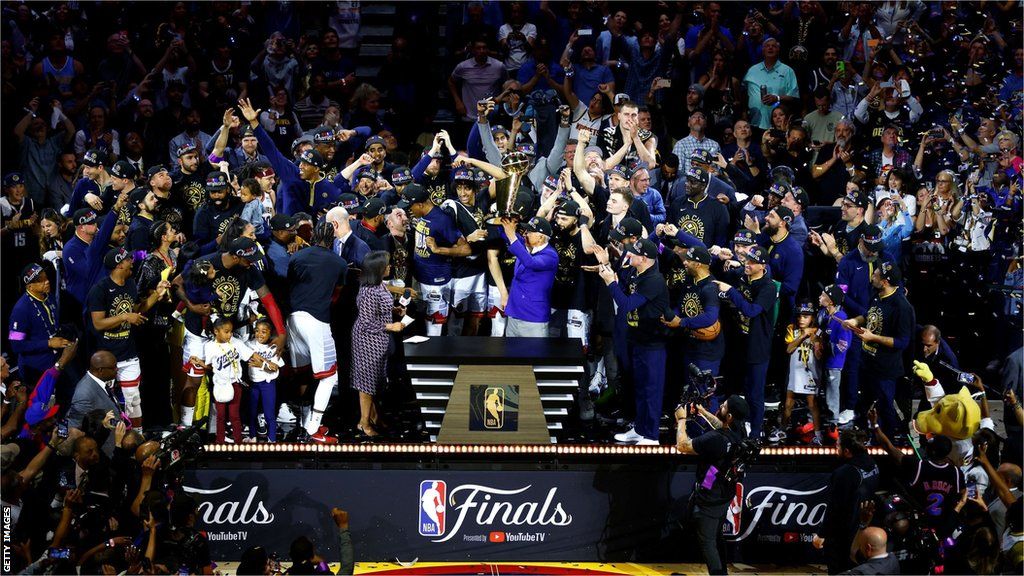 Triumphant Heat claim NBA title, Athletics