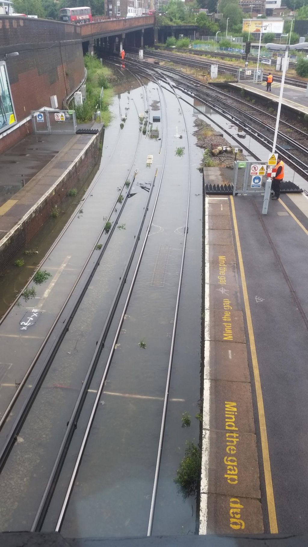 A railway track is flooded at Clapham Junction