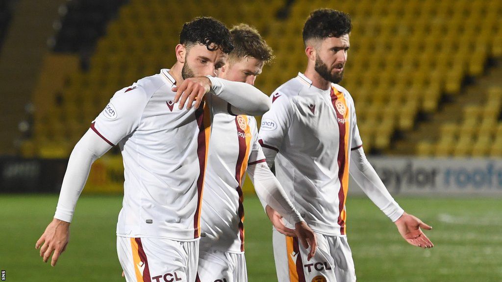 Motherwell's Ricki Lamie, Blair Spittal and Sean Goss look dejected after their draw with Livingston on 2 January