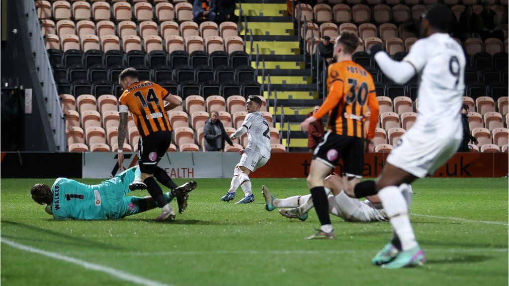 Lewis Payne of Newport County scores against Barnet