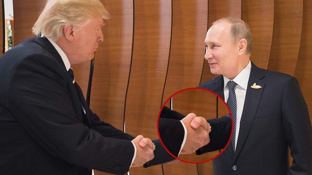 Two alpha males meet - but who had the dominant handshake and who couldn't maintain eye contact?