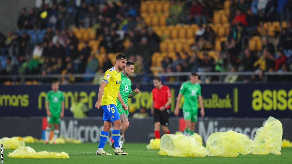 Cadiz fans threw plastic raincoats on to the pitch to protest their side's poor performances