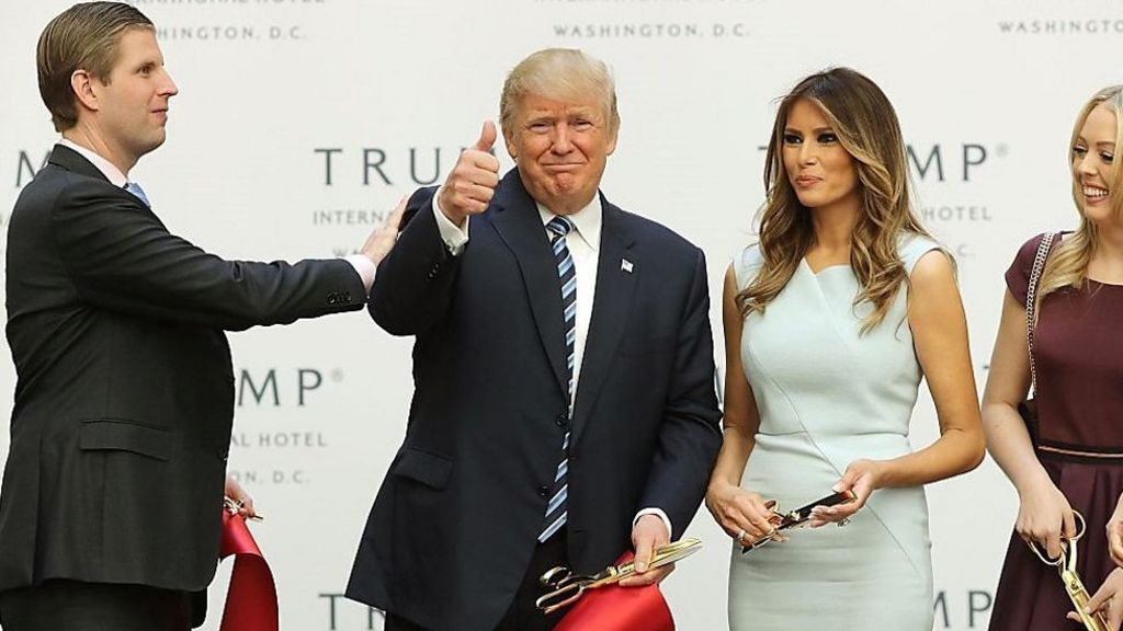 US President Trump sued over business connections