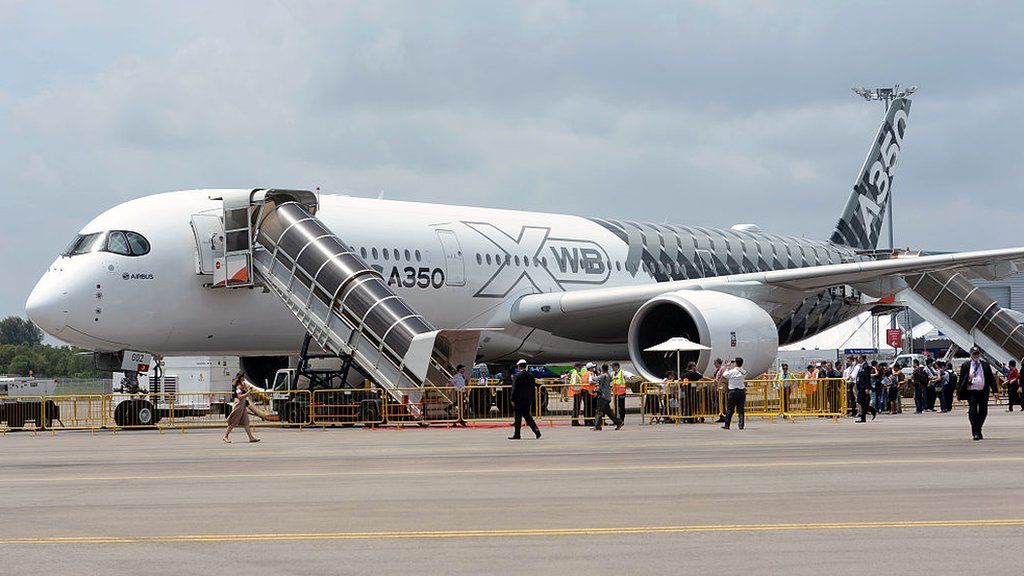 an Airbus A350 XWB commercial aircraft on static display during the Singapore Airshow