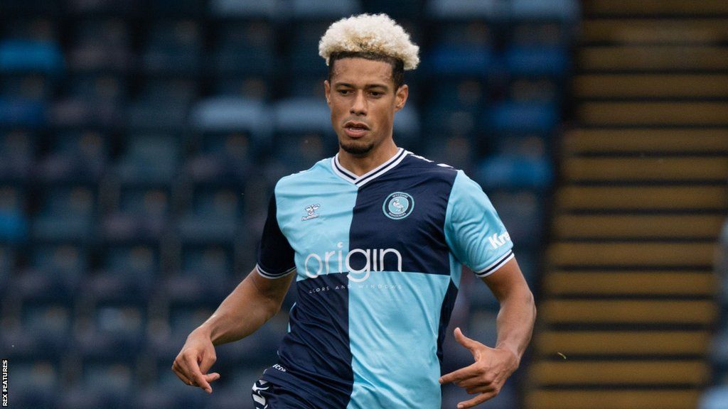 Lyle Taylor made his debut for Wycombe, having been signed in midweek