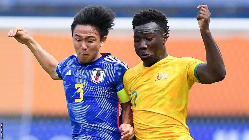 Nestory Irankunda battles for the ball with Keita Kosugi of Japan (left) during an Under-17 Asian Cup match in June 2023