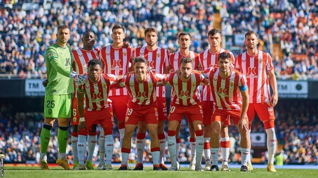 The players of Almeria, who have yet to win in 24 La Liga games this season, pose for a team photo