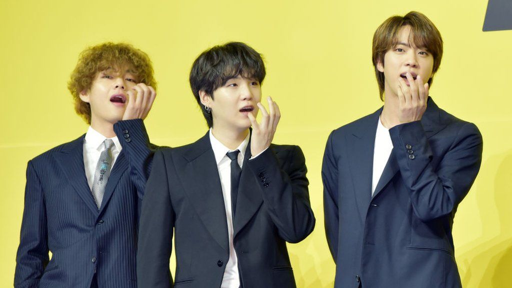 V, Suga, Jin of BTS attend a press conference for BTS's new digital single 'Butter' at Olympic Hall on 21 May 2021 in Seoul, South Korea.
