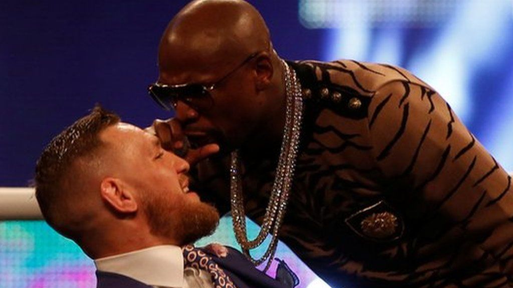 Conor McGregor (left) and Floyd Mayweather