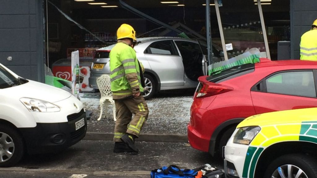 Car crashes into shop window in Belfast