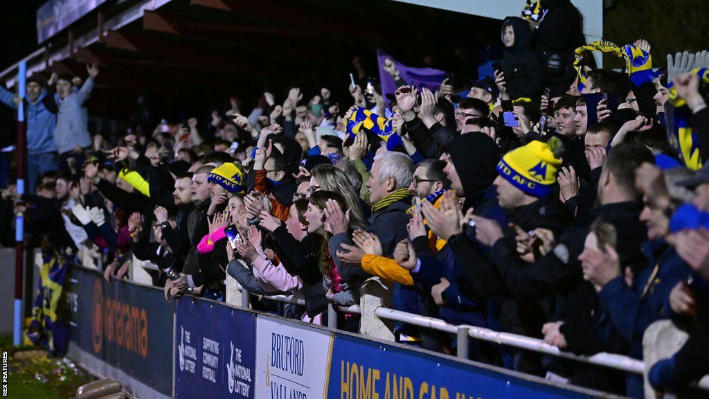 Torquay United fans celebrate at Taunton Town