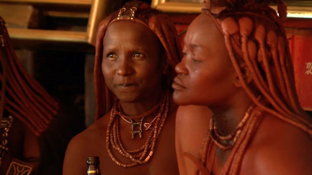 Two women inside Arsenal Bar, Opuwo, Namibia