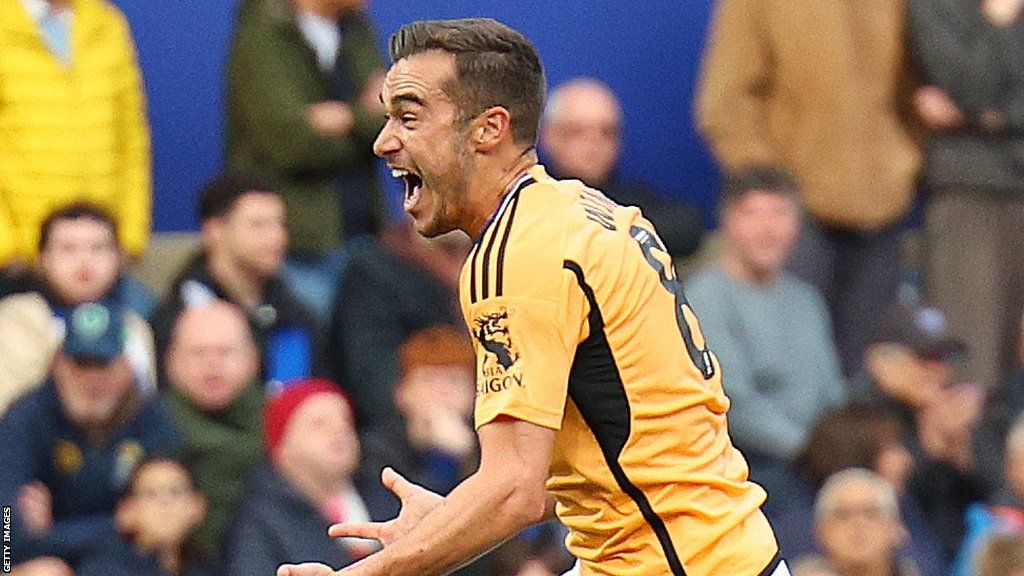 Harry Winks celebrates scoring his first goal for Leicester