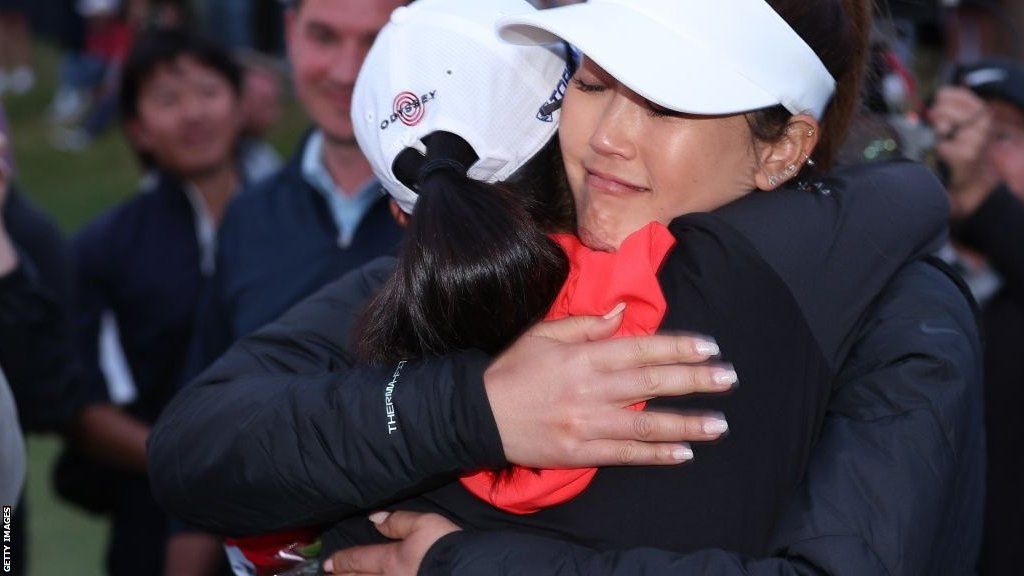 Michelle Wie West congratulates Rose Zhang on her victory